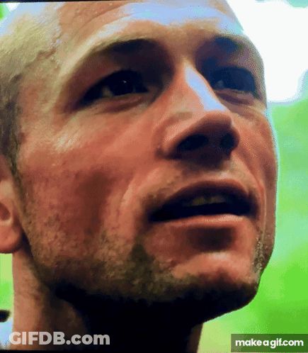 A Close Up Of A Man 'S Face With A Make A Gif.com Watermark GIF