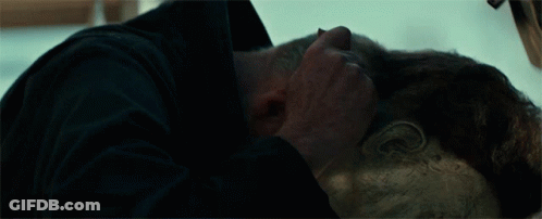 A Close Up Of A Man 'S Face With A Mask On It GIF