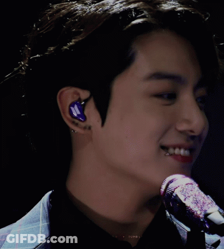 A Close Up Of A Man 'S Face With A Microphone In Front Of Him And A Watermark That Says Tumblr GIF