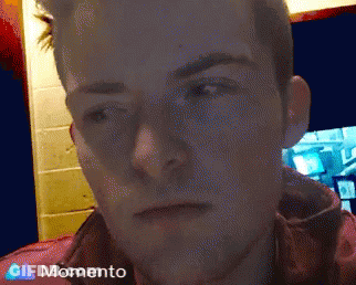 A Close Up Of A Man 'S Face With A Momento Icon In The Corner GIF