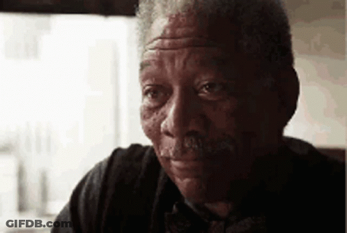 A Close Up Of A Man 'S Face With A Mustache . GIF
