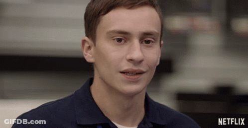A Close Up Of A Man 'S Face With A Netflix Logo On The Bottom GIF