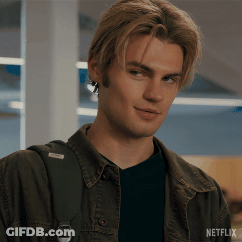 A Close Up Of A Man 'S Face With A Netflix Logo On The Bottom Right GIF