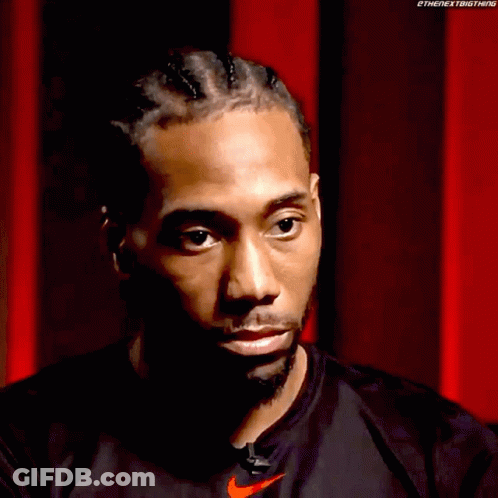 A Close Up Of A Man 'S Face With A Nike Logo On His Shirt GIF