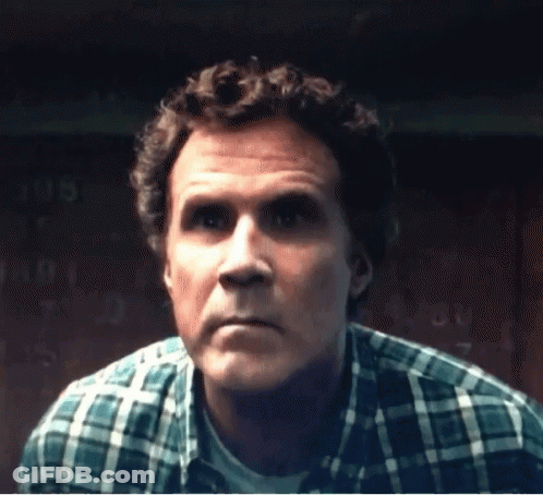 A Close Up Of A Man 'S Face With A Plaid Shirt On GIF