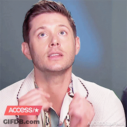A Close Up Of A Man 'S Face With A Red Access / Star Sticker GIF