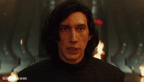 A Close Up Of A Man 'S Face With A Red Arrow Pointing At Him GIF