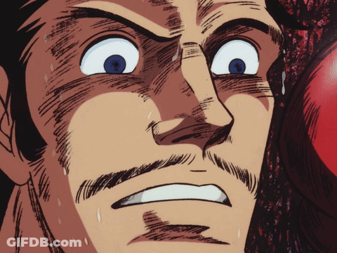 Man's Face With Red Boxing Glove GIF