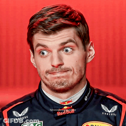 A Close Up Of A Man 'S Face With A Red Bull Shirt On GIF