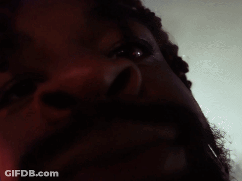 A Close Up Of A Man 'S Face With A Red Eye GIF