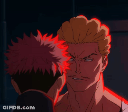 A Close Up Of A Man 'S Face With A Red Glow Around It GIF