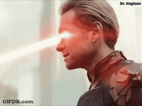 A Close Up Of A Man 'S Face With A Red Light Coming Out Of His Eye And The Words Dr. Vagin On The Bottom GIF