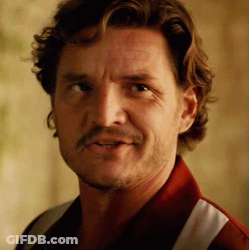 A Close Up Of A Man 'S Face With A Red Shirt On GIF