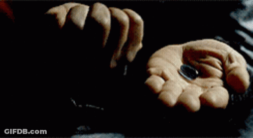 A Close Up Of A Man 'S Face With A Reflection Of A Woman GIF