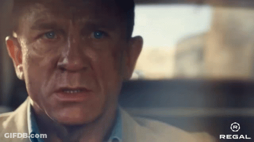 A Close Up Of A Man 'S Face With A Regal Logo On The Bottom Right GIF