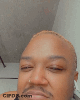 A Close Up Of A Man 'S Face With A Ring In His Nose GIF