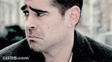 A Close Up Of A Man 'S Face With A Sad Look On His Face GIF
