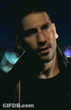 A Close Up Of A Man 'S Face With A Scratch On It GIF