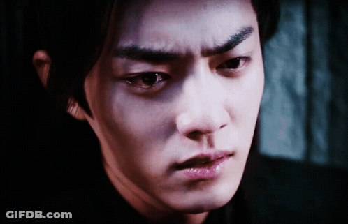 A Close Up Of A Man 'S Face With A Serious Expression GIF