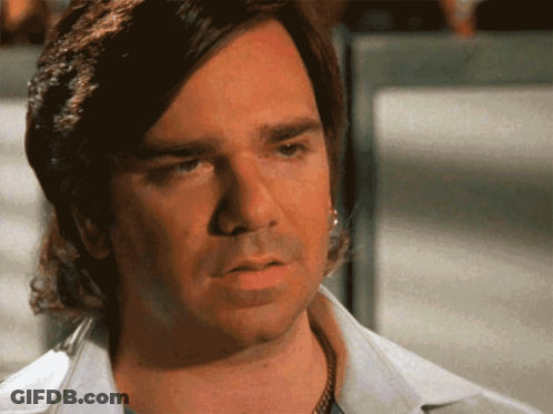 A Close Up Of A Man 'S Face With A Serious Expression GIF