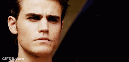 A Close Up Of A Man 'S Face With A Serious Expression GIF