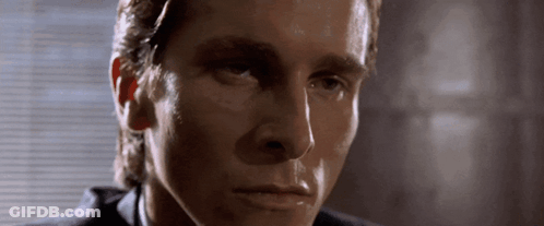 A Close Up Of A Man 'S Face With A Serious Expression GIF
