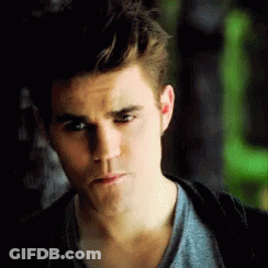 A Close Up Of A Man 'S Face With A Serious Expression . GIF