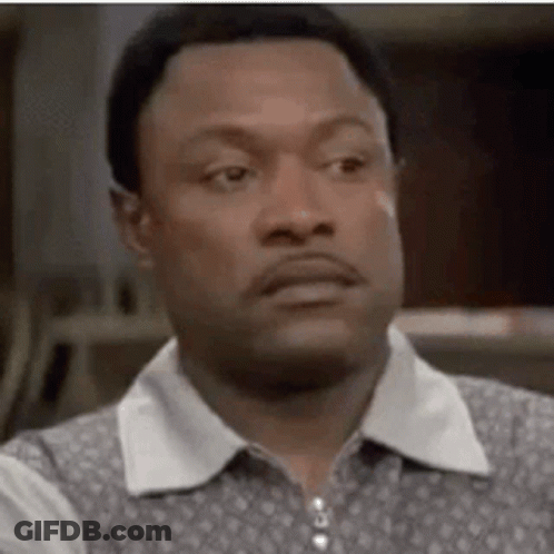 A Close Up Of A Man 'S Face With A Serious Expression . GIF