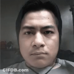 A Close Up Of A Man 'S Face With A Serious Expression GIF