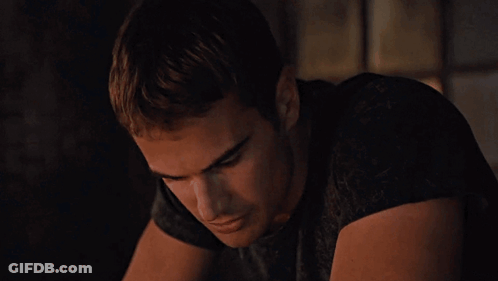 A Close Up Of A Man 'S Face With A Serious Look On His Face GIF