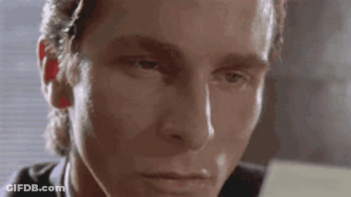 A Close Up Of A Man 'S Face With A Serious Look On His Face GIF