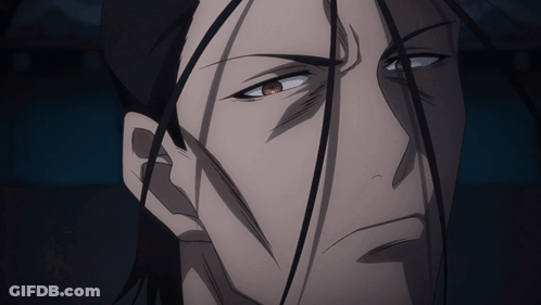 A Close Up Of A Man 'S Face With A Serious Look On His Face GIF