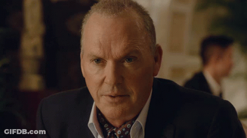 A Close Up Of A Man 'S Face With A Serious Look On His Face GIF