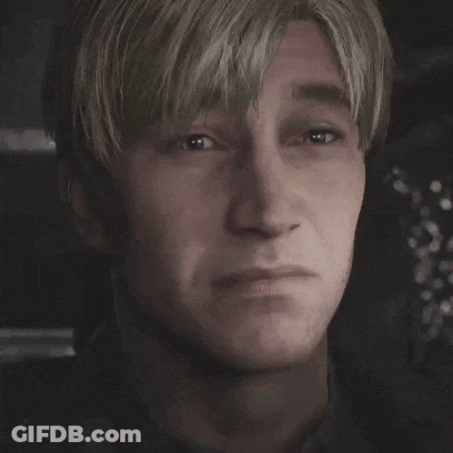 A Close Up Of A Man 'S Face With A Serious Look On His Face GIF