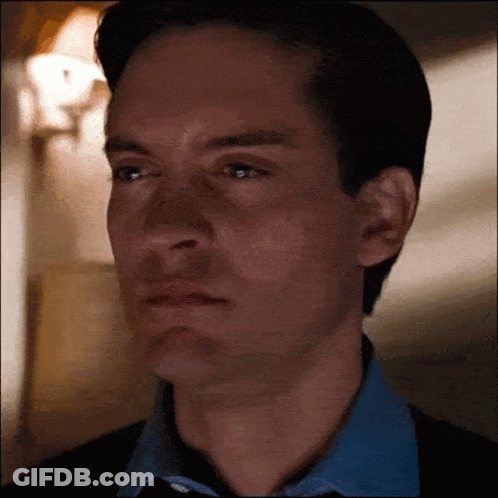 A Close Up Of A Man 'S Face With A Serious Look On His Face GIF