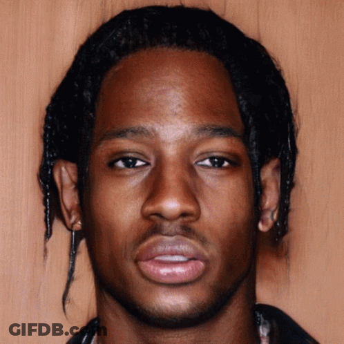 A Close Up Of A Man 'S Face With A Serious Look On His Face GIF