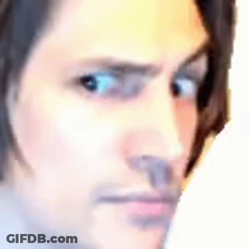 Close Up Of Man's Serious Face GIF