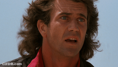 A Close Up Of A Man 'S Face With A Shocked Look On His Face GIF