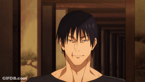 A Close Up Of A Man 'S Face With A Slight Smile On His Face GIF