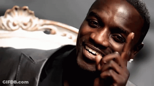 A Close Up Of A Man 'S Face With A Smile GIF