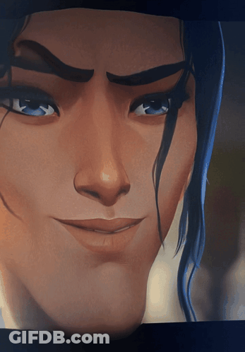 A Close Up Of A Man 'S Face With A Smile On His Face GIF