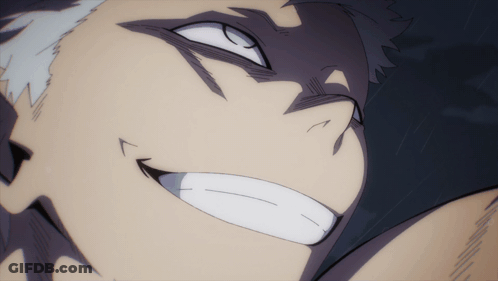 A Close Up Of A Man 'S Face With A Smile On It GIF