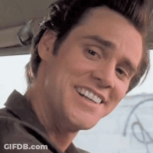 A Close Up Of A Man 'S Face With A Smile On It GIF