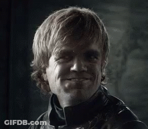 A Close Up Of A Man 'S Face With A Smile On It . GIF