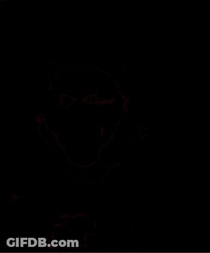 A Close Up Of A Man 'S Face With A Smile On It GIF
