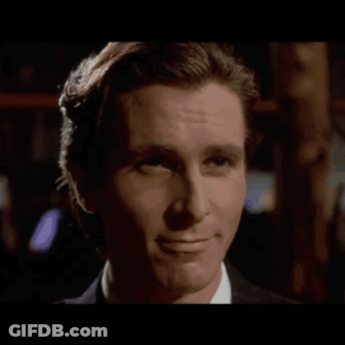 A Close Up Of A Man 'S Face With A Smile On It GIF