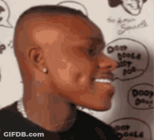 A Close Up Of A Man 'S Face With A Speech Bubble That Says Dooy Dooy Dooo GIF