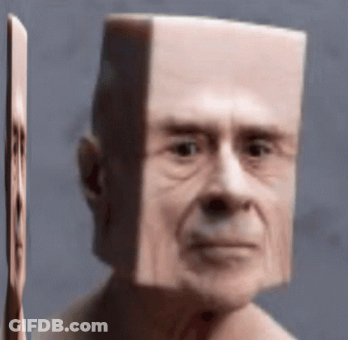 A Close Up Of A Man 'S Face With A Square Head . GIF