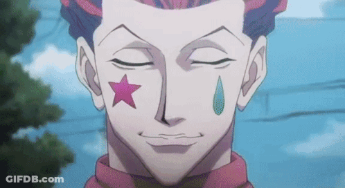A Close Up Of A Man 'S Face With A Star And A Tear On His Cheek . GIF