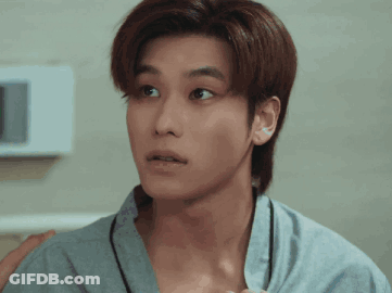 A Close Up Of A Man 'S Face With A Surprised Expression GIF